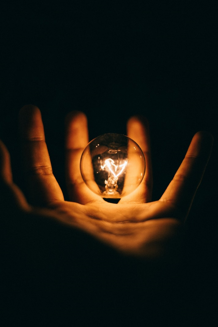 A lightbulb in a hand