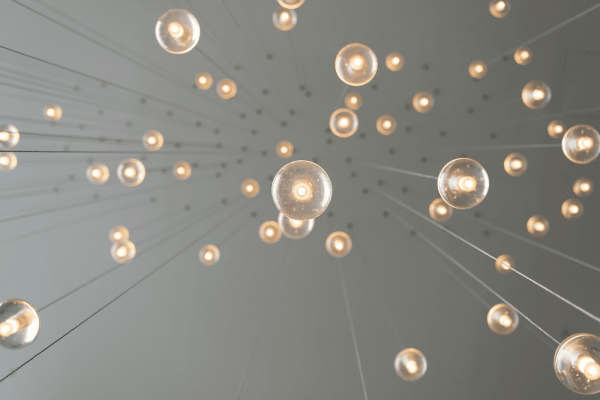 Multiple lightbulbs hanging from the ceiling
