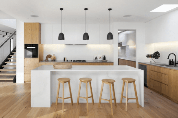 A small kitchen with a white island